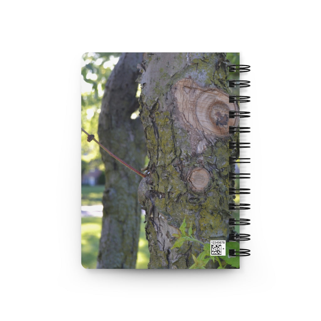 Tree Stump and Green Leaves Spiral Bound Journal with glossy cover and lined pages, perfect for writing and journaling.