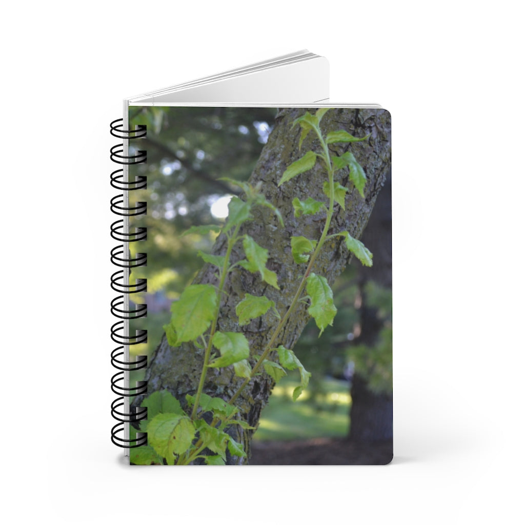 Tree Stump and Green Leaves Spiral Bound Journal with glossy cover and lined pages, perfect for writing and journaling.