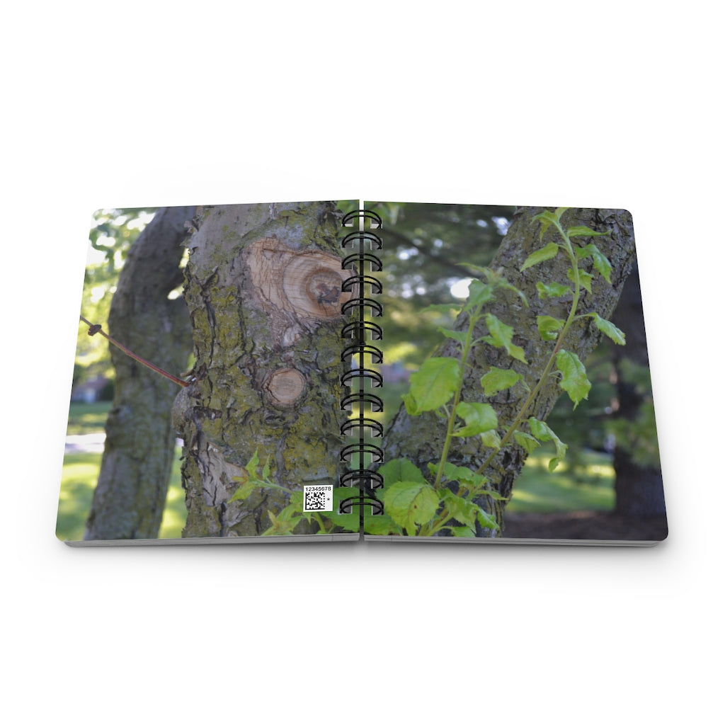 Tree Stump and Green Leaves Spiral Bound Journal with glossy cover and lined pages, perfect for writing and journaling.