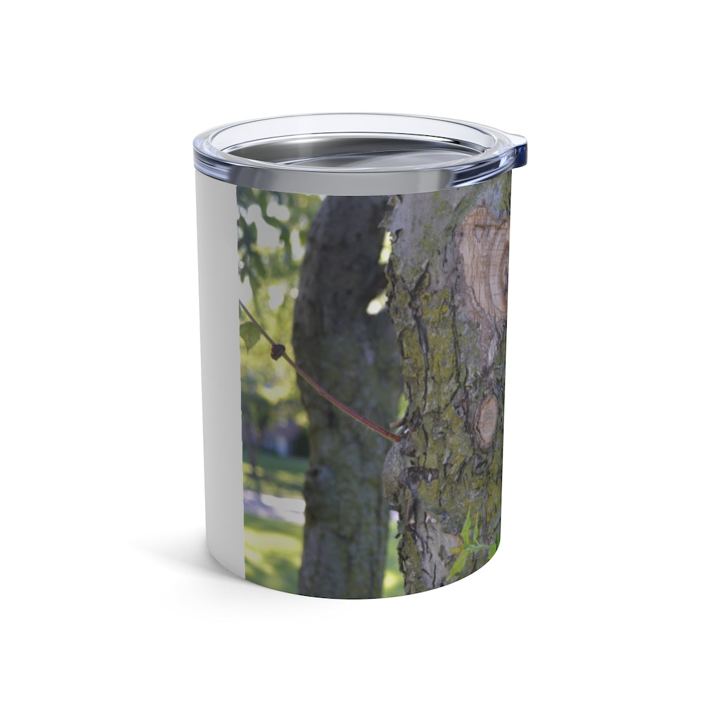 10oz stainless steel tumbler featuring a tree stump design with green leaves, perfect for travel and everyday use.