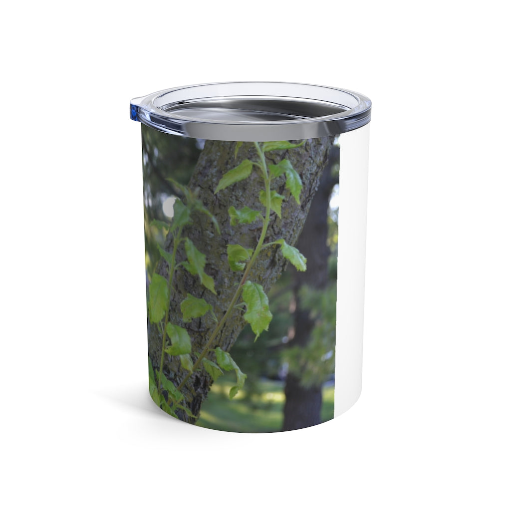 10oz stainless steel tumbler featuring a tree stump design with green leaves, perfect for travel and everyday use.