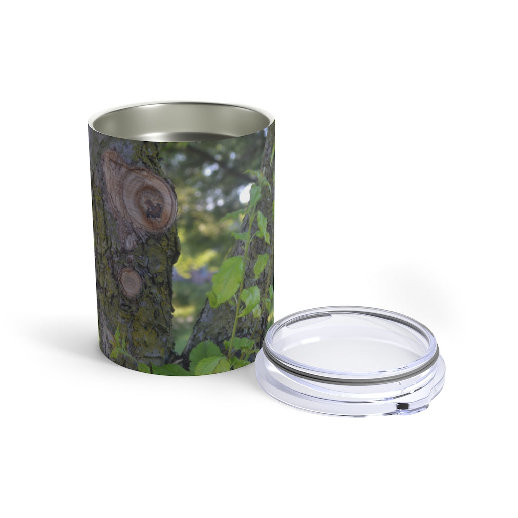 10oz stainless steel tumbler featuring a tree stump design with green leaves, perfect for travel and everyday use.