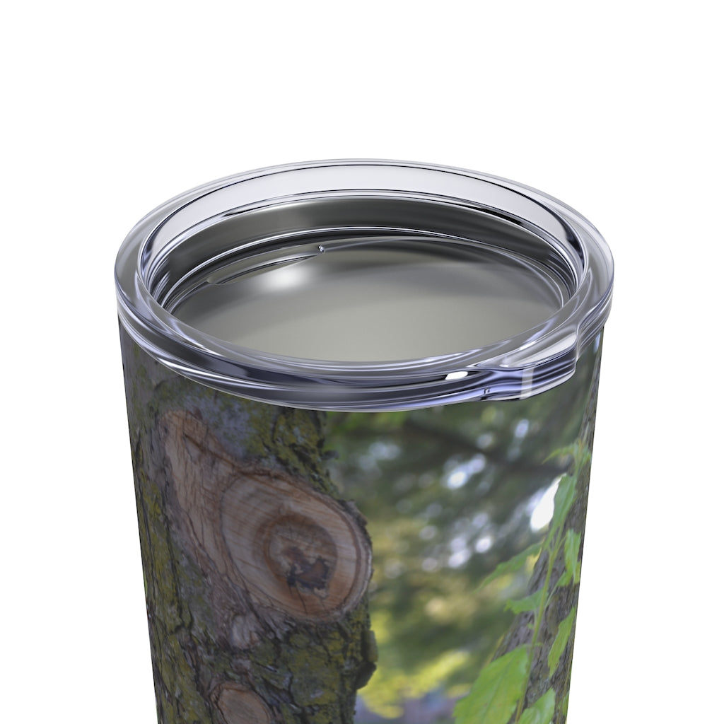 10oz stainless steel tumbler featuring a tree stump design with green leaves, perfect for travel and everyday use.