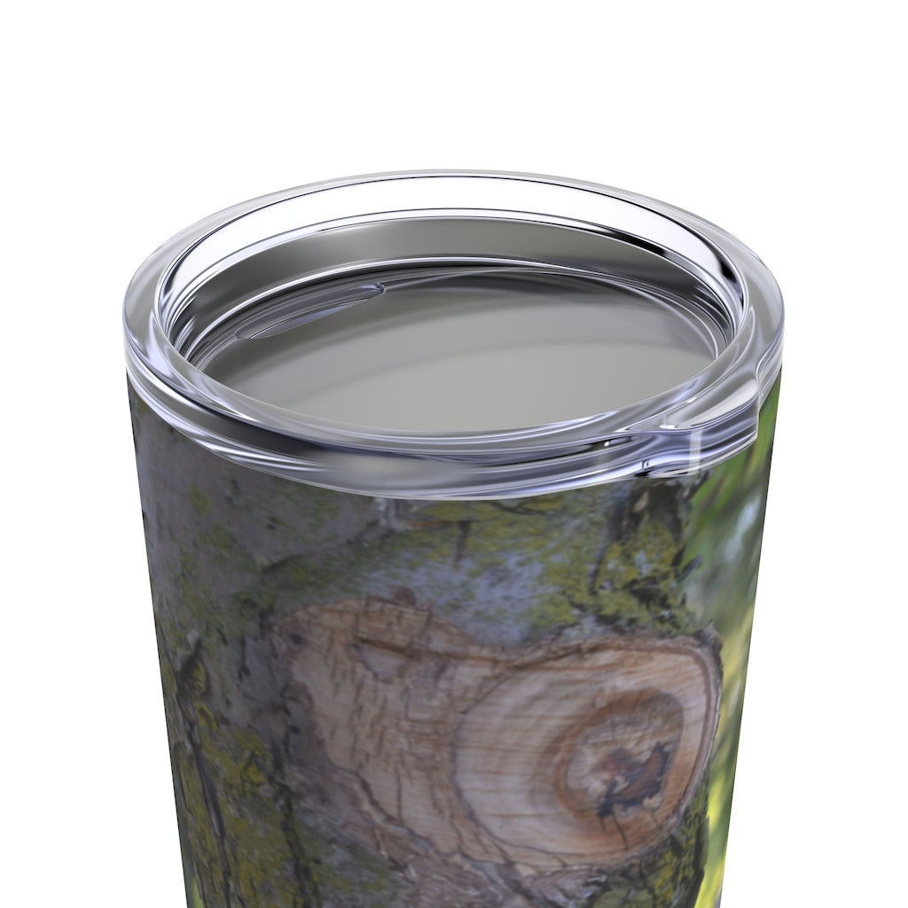 20oz stainless steel tumbler featuring a tree stump and green leaves design, perfect for travel and outdoor use.