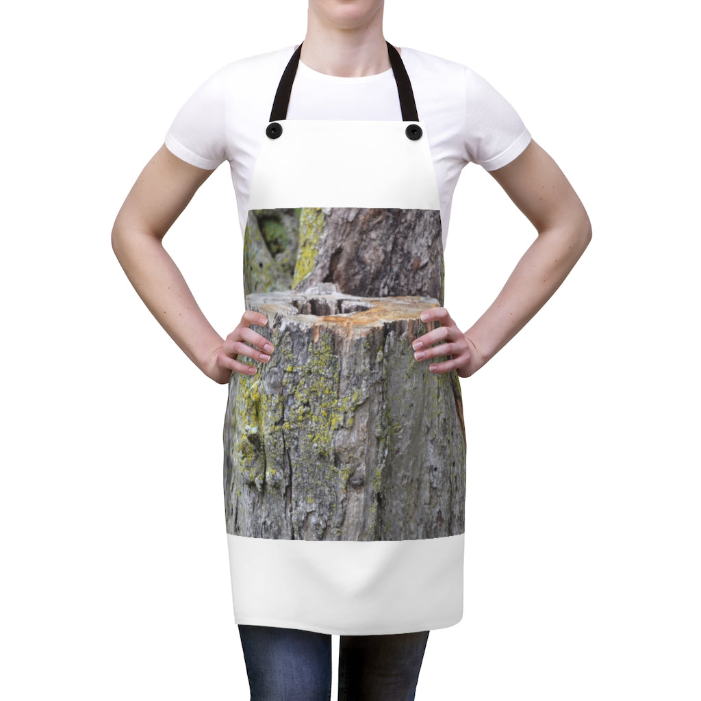 Tree Stump Apron featuring a unique tree stump design, made from durable polyester with black detachable twill straps.