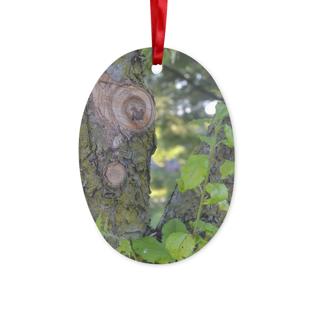 Tree Stump Ceramic Hanging Ornament with red ribbon and gold string, beautifully crafted for holiday decor.