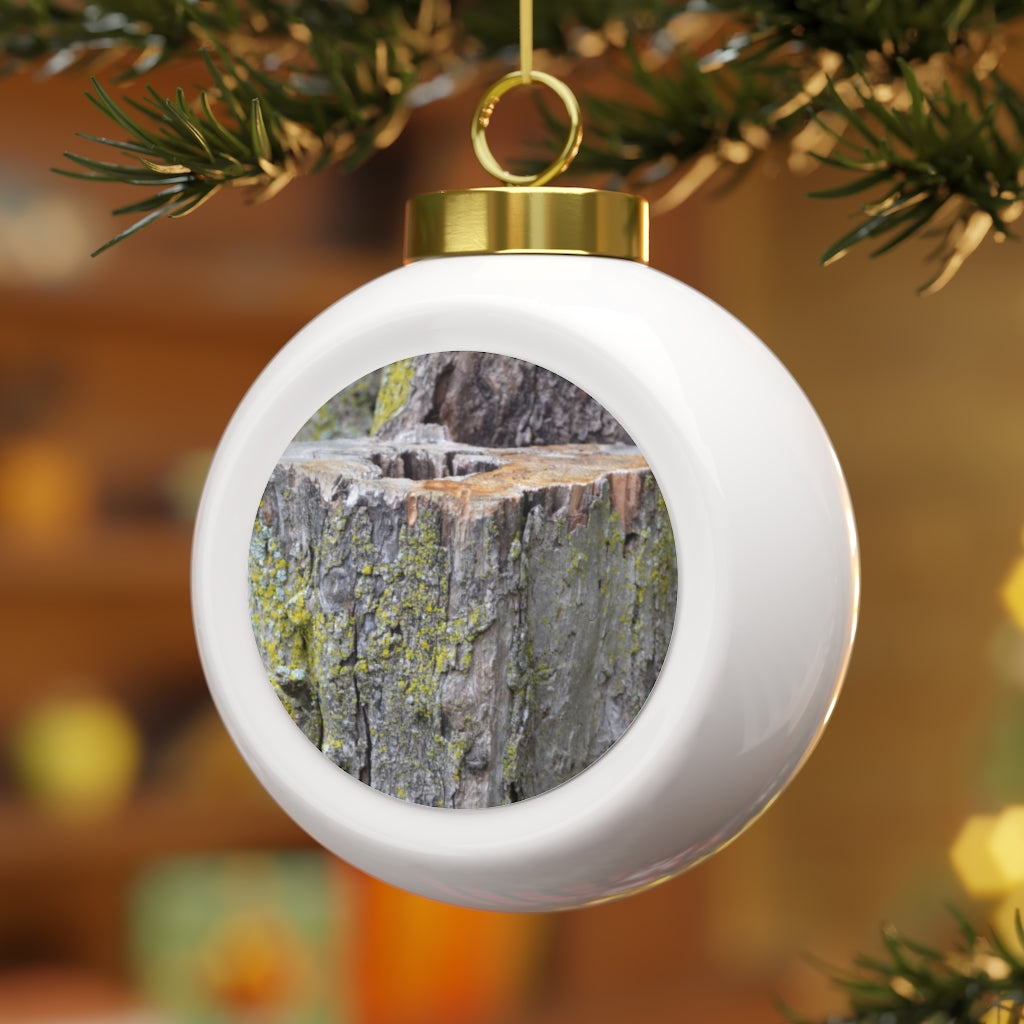 A beautifully designed 3-inch Tree Stump Christmas Ball Ornament with a glossy finish and gold ribbon, featuring a vintage style and customizable metal insert.