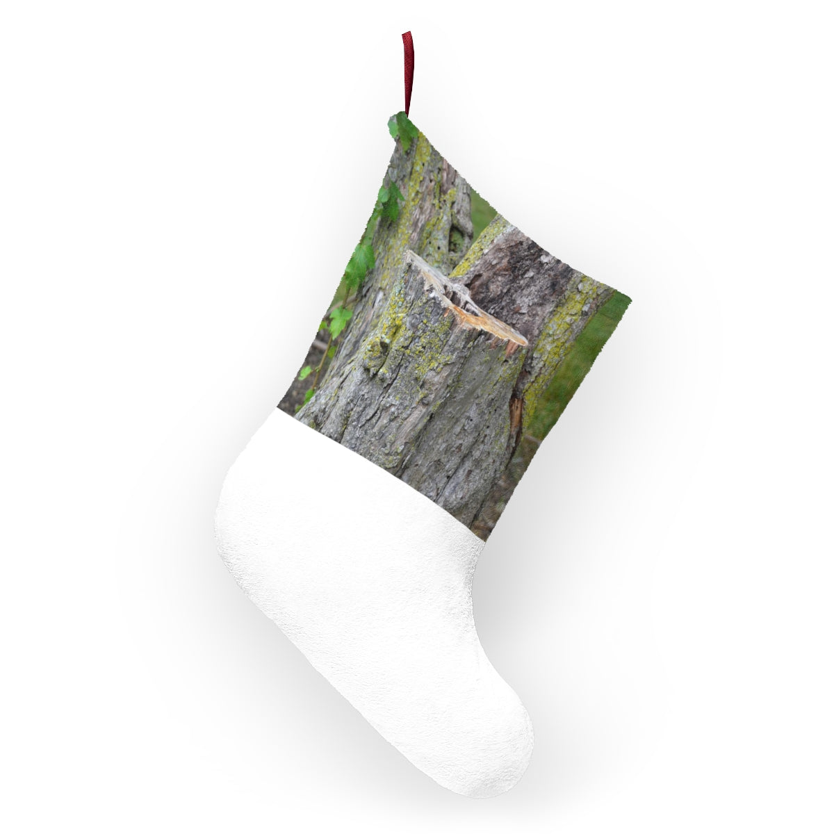 Personalized Tree Stump Christmas Stockings hanging by a fireplace, showcasing festive designs and soft fleece material.