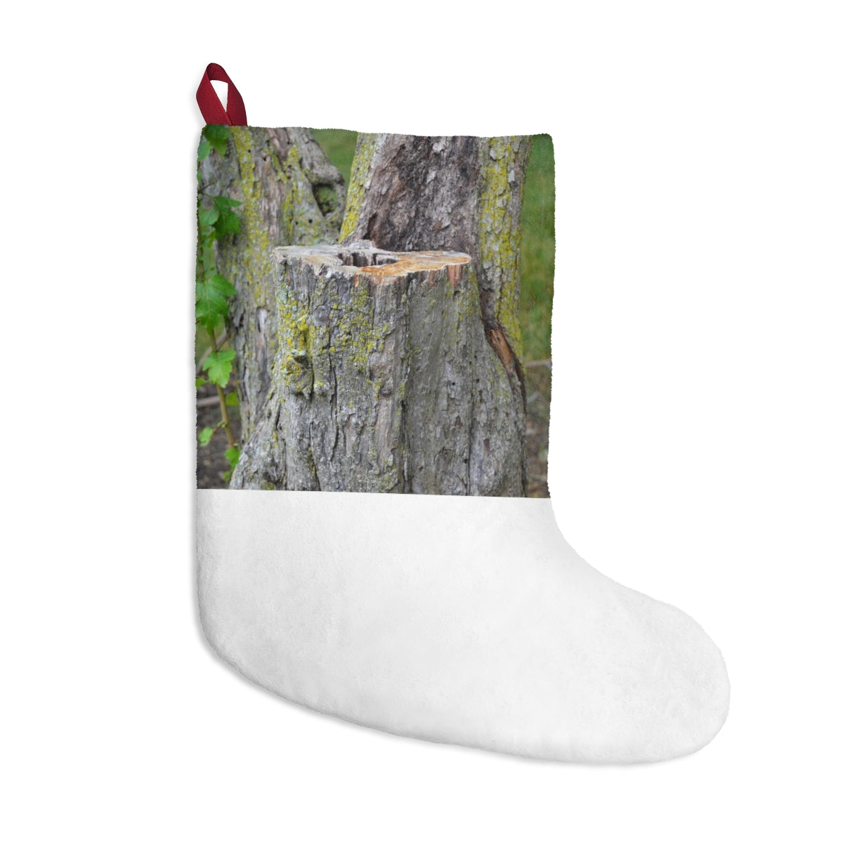 Personalized Tree Stump Christmas Stockings hanging by a fireplace, showcasing festive designs and soft fleece material.