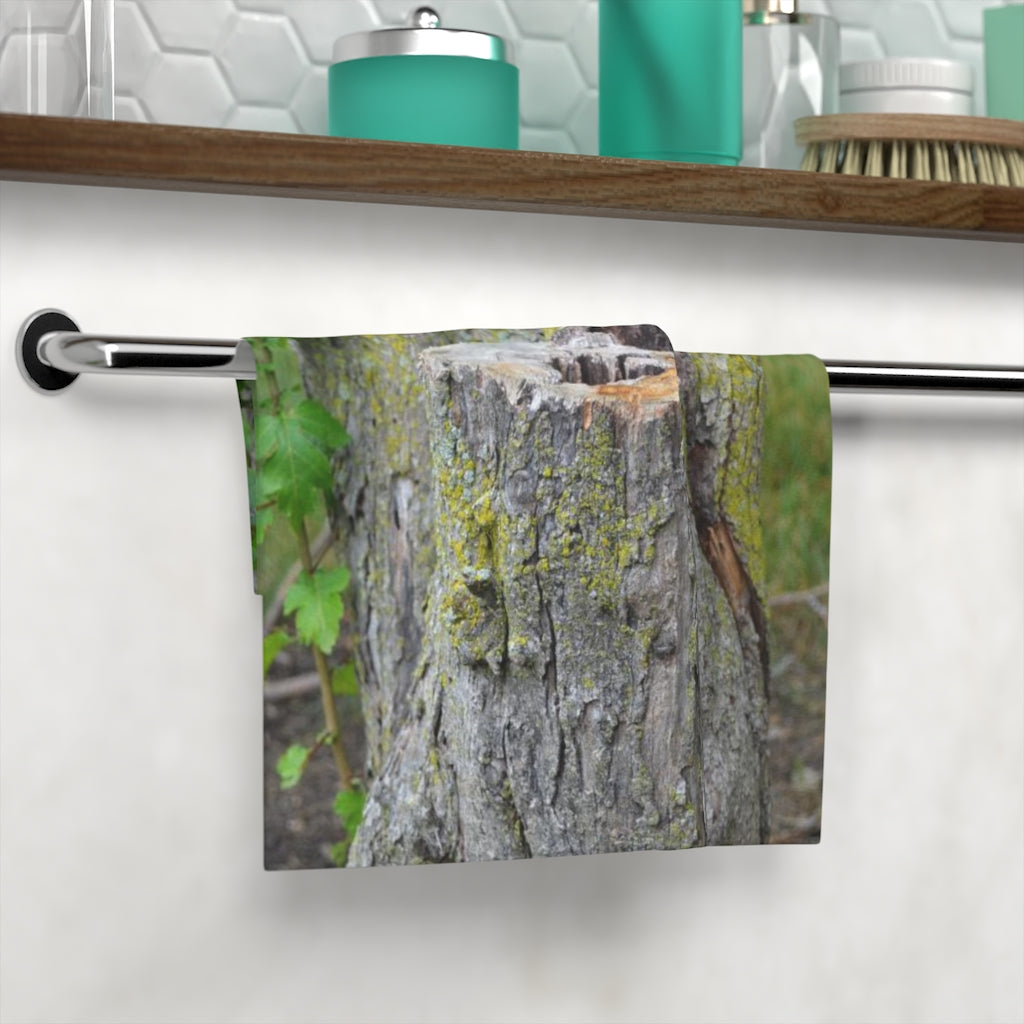 Tree Stump Face Towel featuring a customizable polyester front and soft cotton back, ideal for bathroom use.