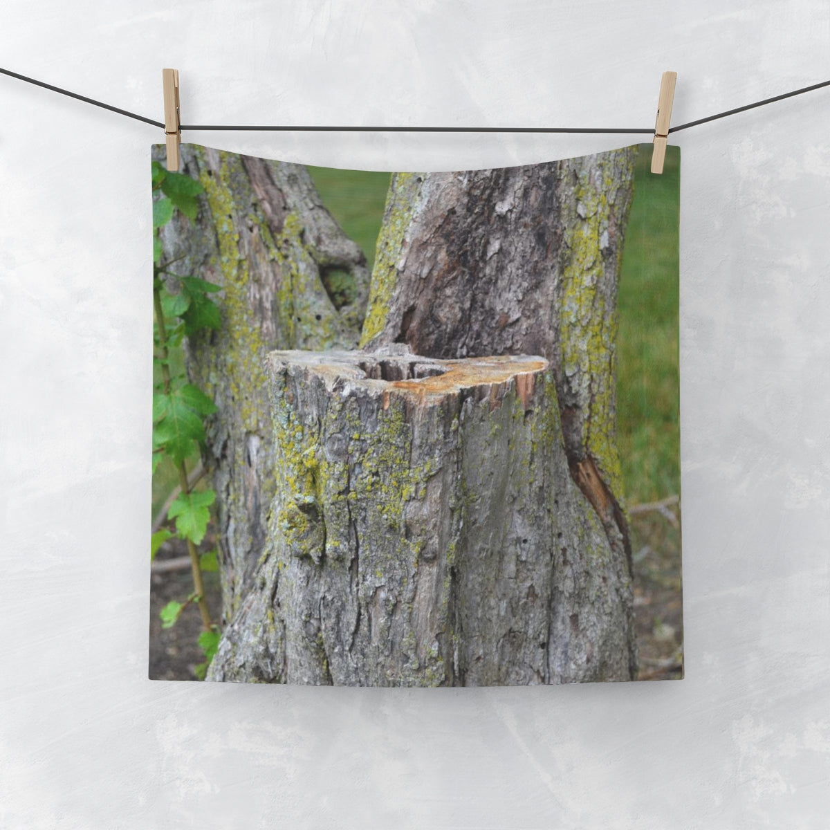 Tree Stump Face Towel featuring a customizable polyester front and soft cotton back, ideal for bathroom use.