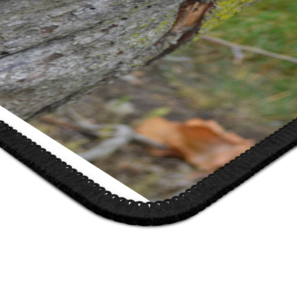 Tree Stump Gaming Mouse Pad featuring vibrant colors and stitched edges, measuring 9x7 inches, perfect for gaming and work.