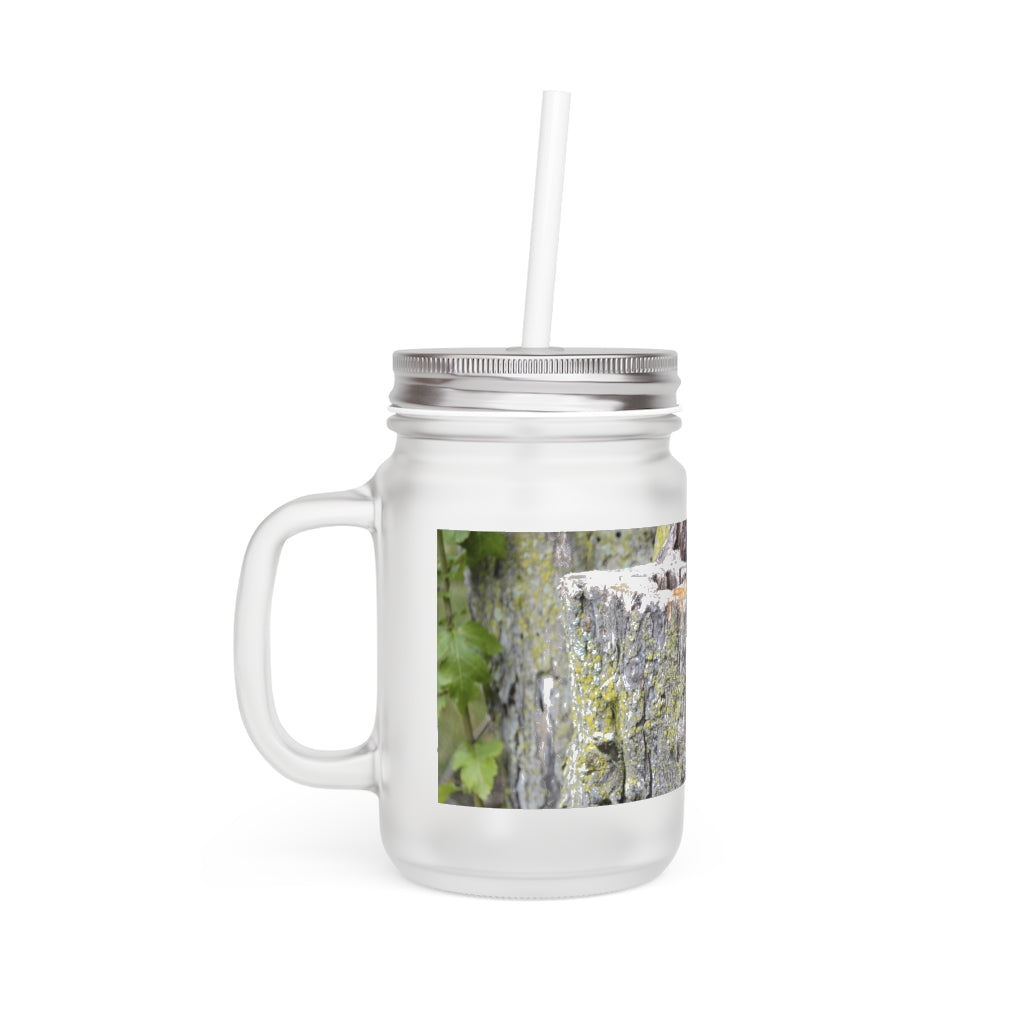 A stylish Tree Stump Mason Jar made of frosted glass, featuring a straw and lid, perfect for personalized drinks.