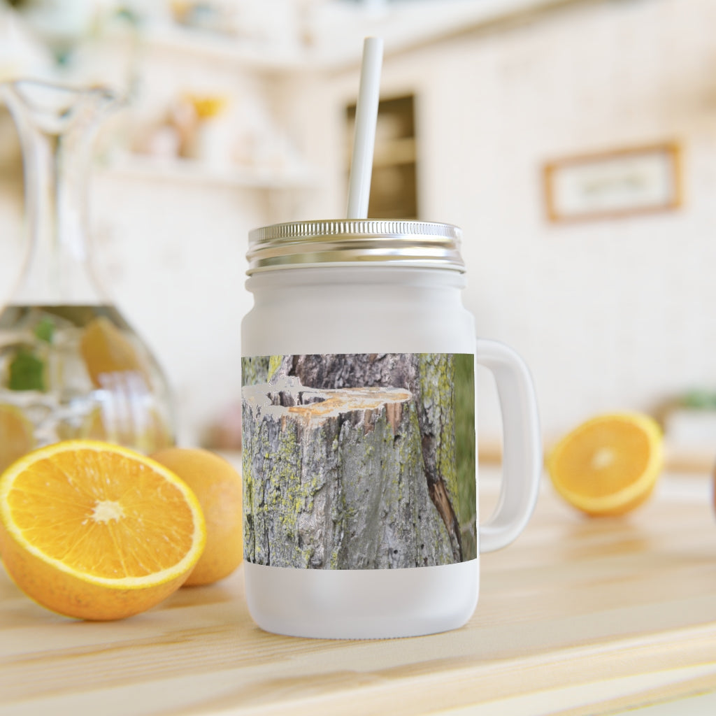 A stylish Tree Stump Mason Jar made of frosted glass, featuring a straw and lid, perfect for personalized drinks.