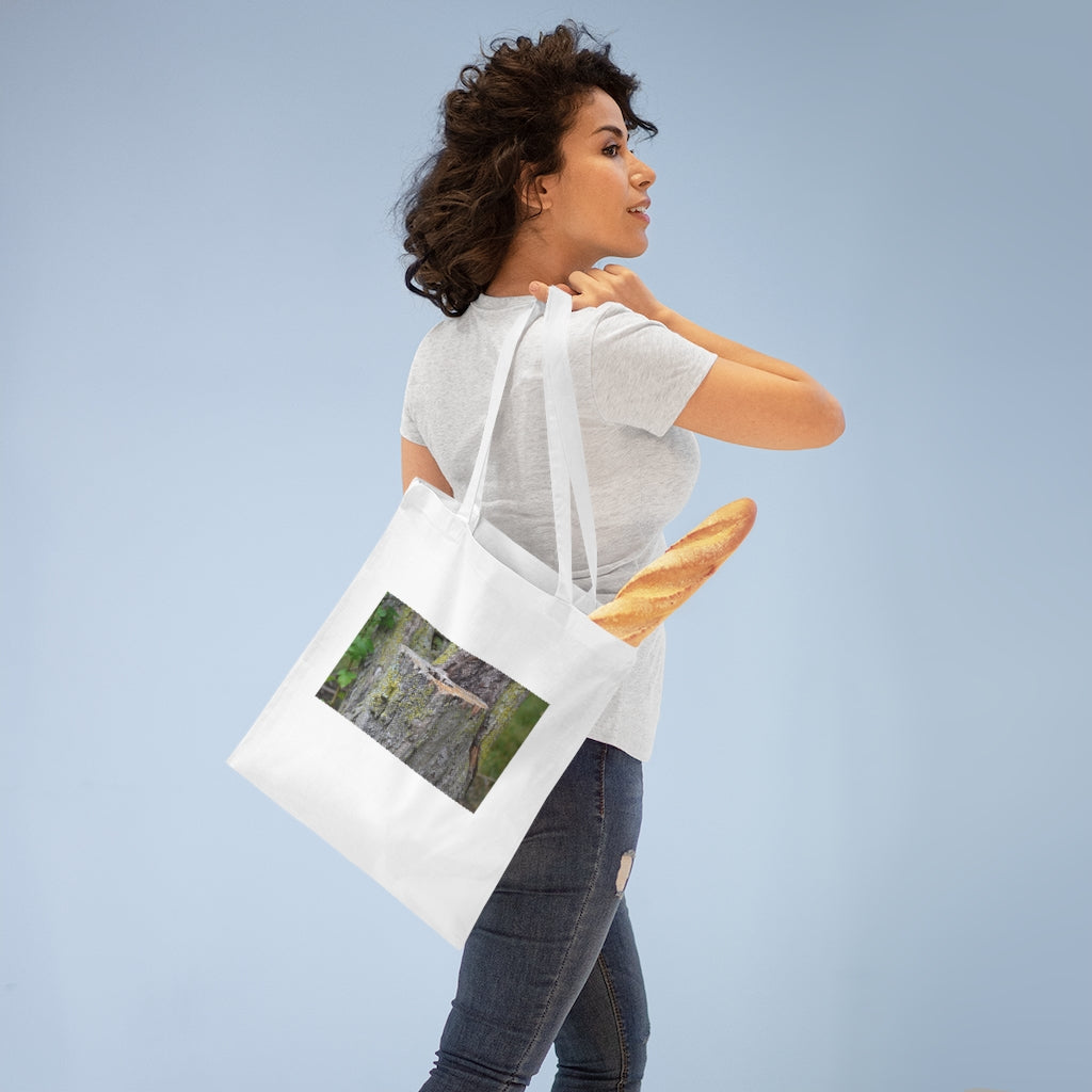 Tree Stump Tote Bag made of 100% cotton with long cross-stitched handles, available in various colors.