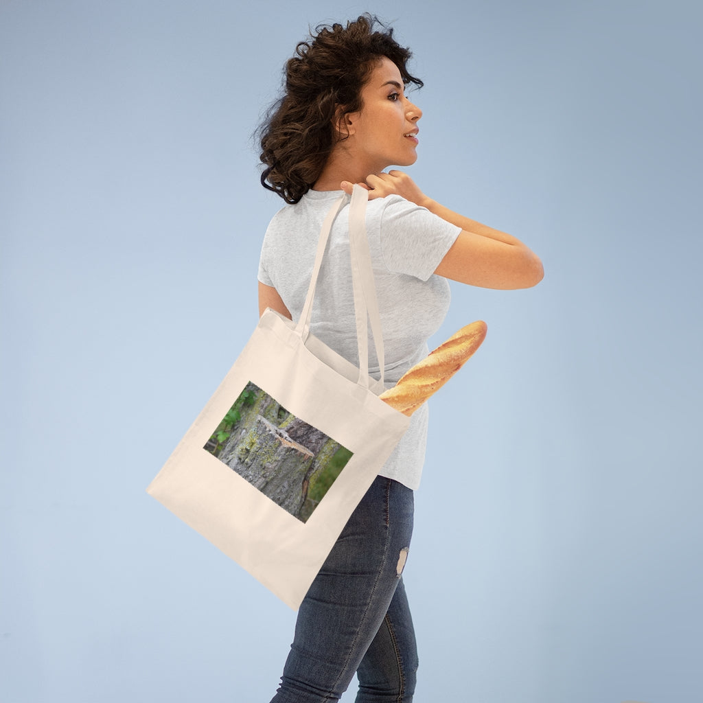 Tree Stump Tote Bag made of 100% cotton with long cross-stitched handles, available in various colors.