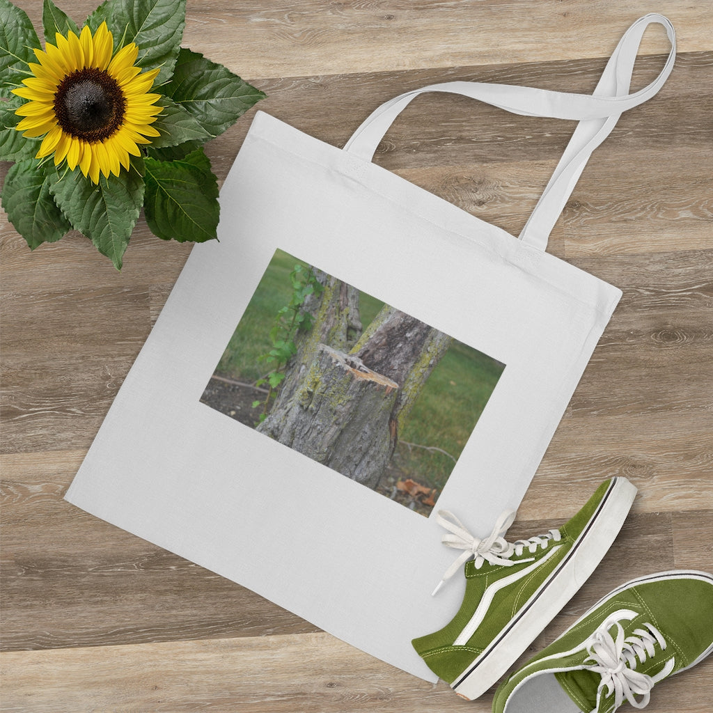 Tree Stump Tote Bag made of 100% cotton with long handles and cross stitching, available in multiple colors.