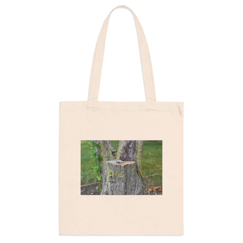 Tree Stump Tote Bag made of 100% cotton with long handles and cross stitching, available in multiple colors.