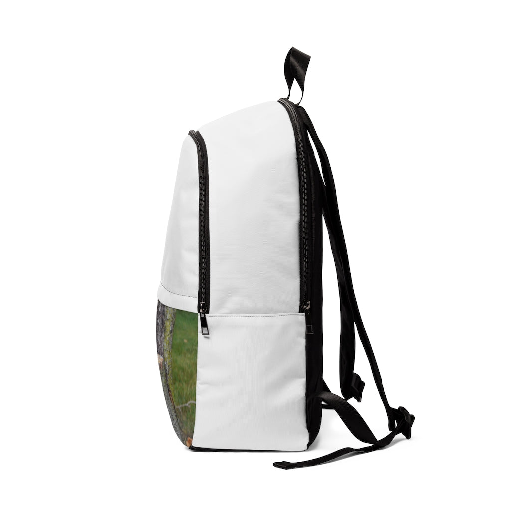 Tree Stump Unisex Fabric Backpack featuring a stylish design, padded back panel, and adjustable straps, perfect for school and outdoor use.