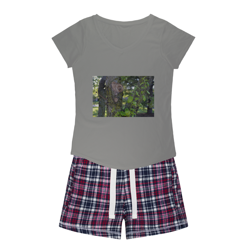 Tree Stump Women's Sleepy Tee and Flannel Short set featuring a relaxed fit T-shirt and colorful flannel shorts, perfect for cozy nights.