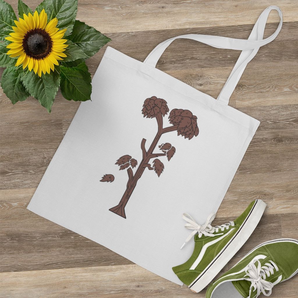 A stylish Tree Tote Bag made of 100% cotton, featuring long handles and cross stitching for durability, available in multiple colors.