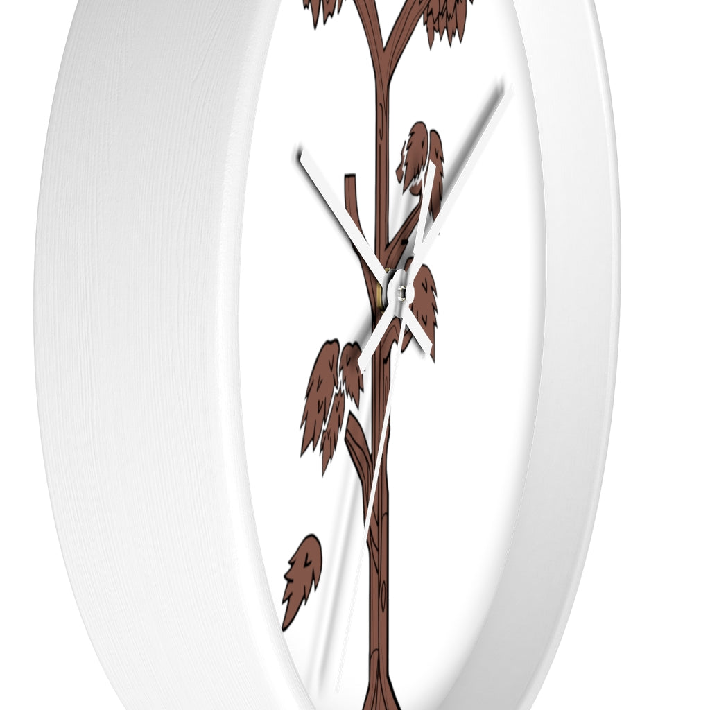 A beautifully designed Tree Wall Clock featuring a wooden frame and a clear plexiglass face, showcasing a unique tree-inspired design.