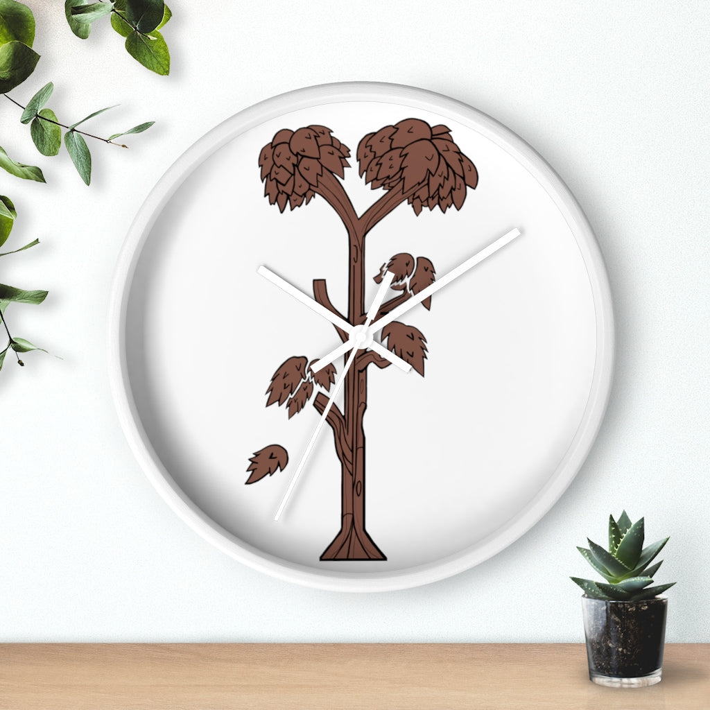 A beautifully designed Tree Wall Clock featuring a wooden frame and a clear plexiglass face, showcasing a unique tree-inspired design.