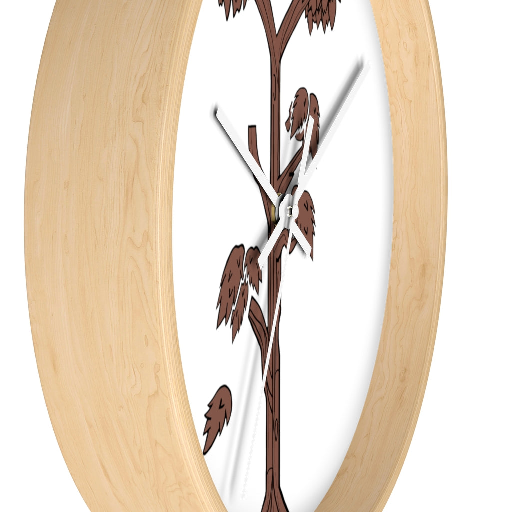 A beautifully designed Tree Wall Clock featuring a wooden frame and a clear plexiglass face, showcasing a unique tree-inspired design.