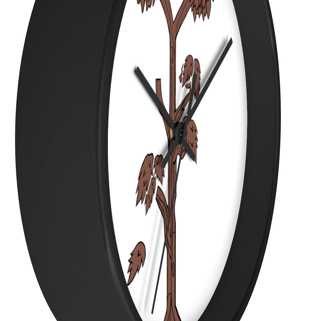 A beautifully designed Tree Wall Clock featuring a wooden frame and a clear plexiglass face, showcasing a unique tree-inspired design.