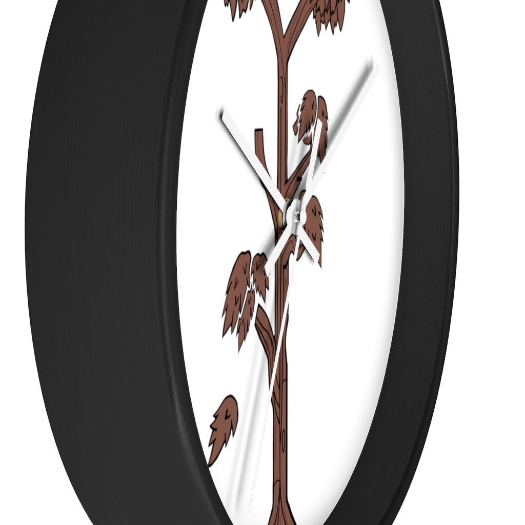 A beautifully designed Tree Wall Clock featuring a wooden frame and a clear plexiglass face, showcasing a unique tree-inspired design.