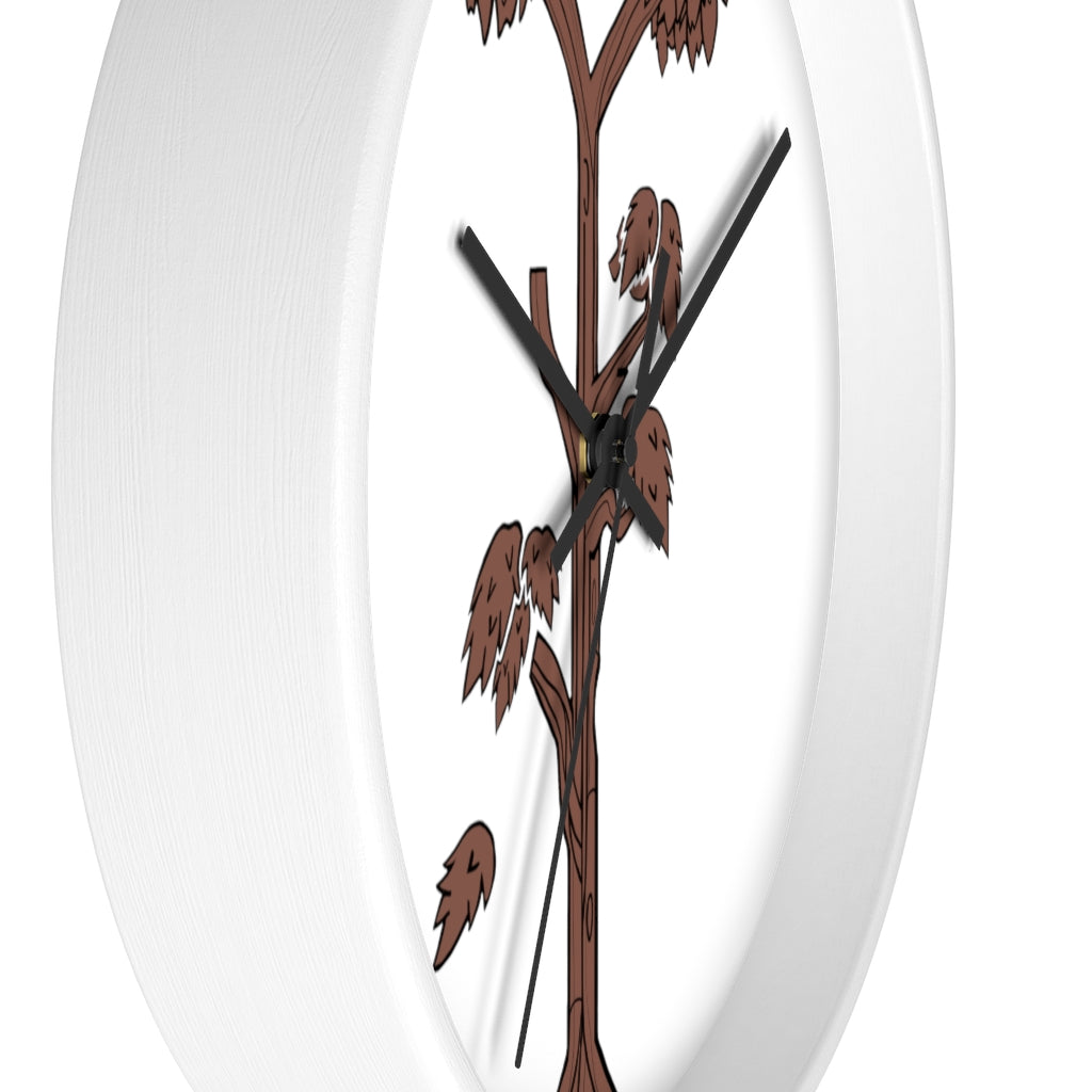 A beautifully designed Tree Wall Clock featuring a wooden frame and a clear plexiglass face, showcasing a unique tree-inspired design.