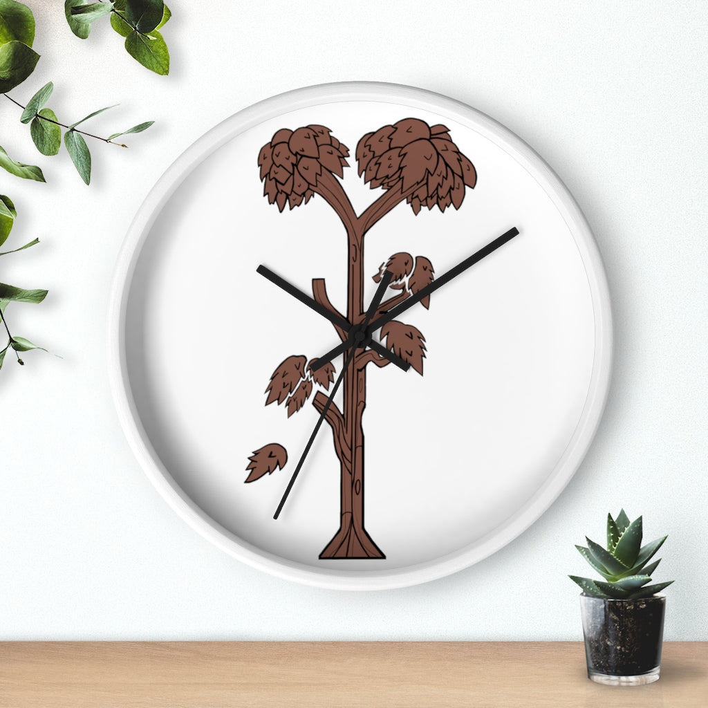 A beautifully designed Tree Wall Clock featuring a wooden frame and a clear plexiglass face, showcasing a unique tree-inspired design.