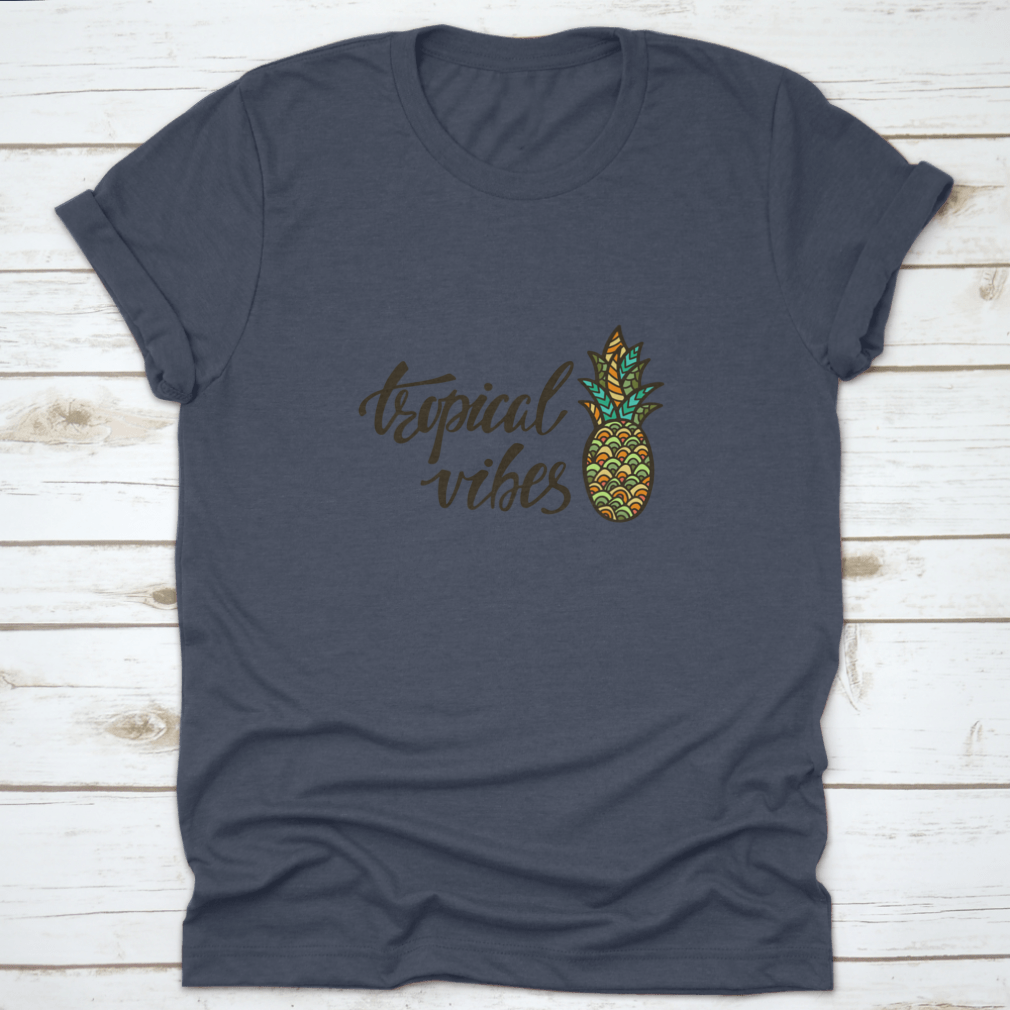 A stylish Tropical Vibes T-shirt featuring modern calligraphy with an inspirational summer quote, made from soft cotton fabric.