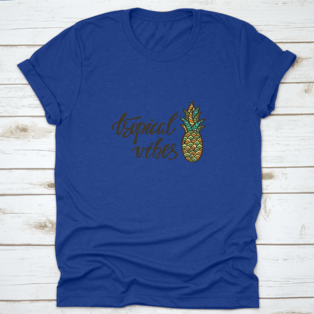 A stylish Tropical Vibes T-shirt featuring modern calligraphy with an inspirational summer quote, made from soft cotton fabric.