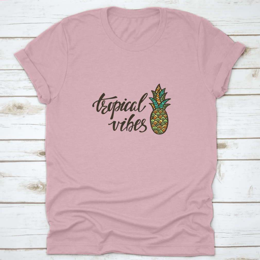 A stylish Tropical Vibes T-shirt featuring modern calligraphy with an inspirational summer quote, made from soft cotton fabric.