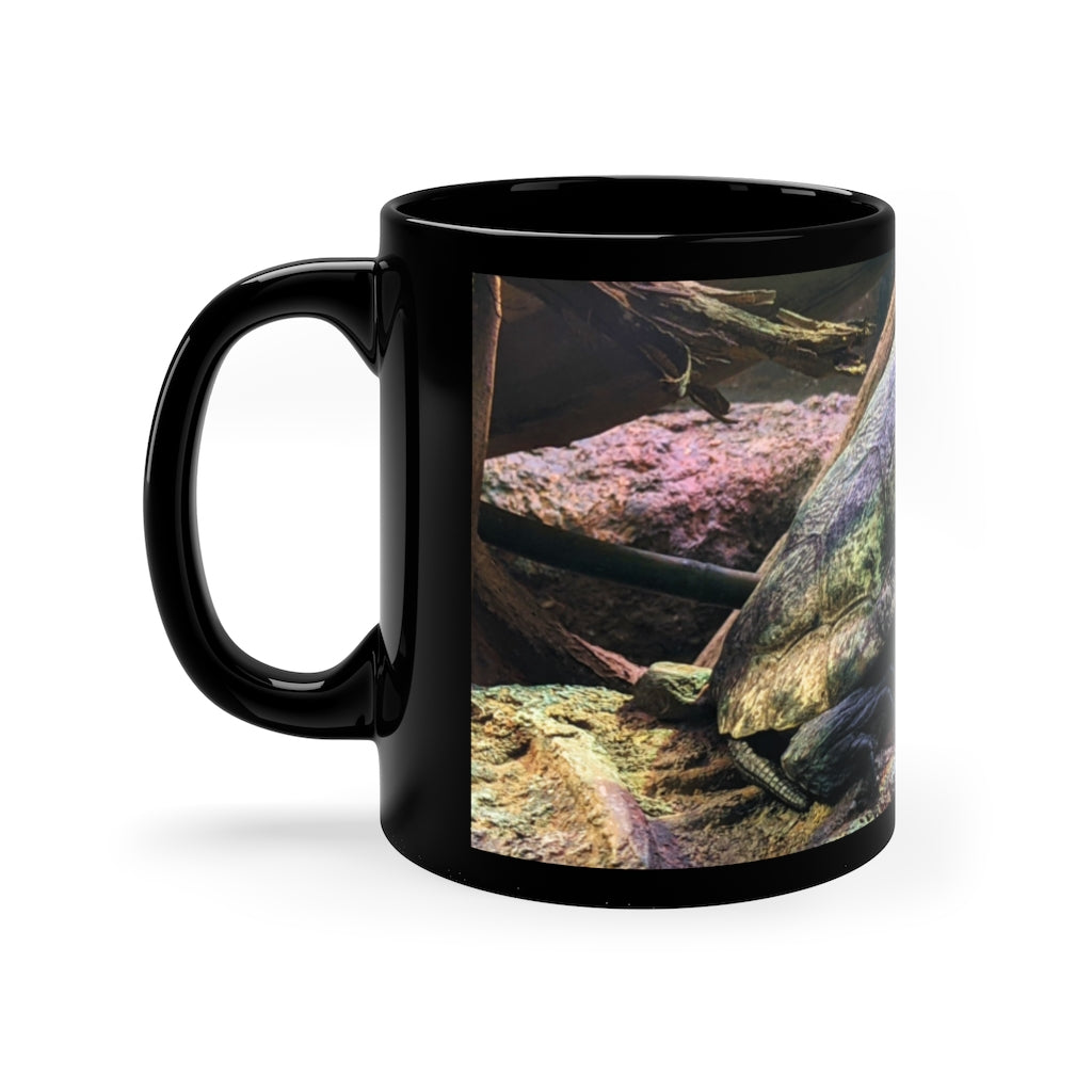 Turtle 11oz black ceramic mug with a sleek design, perfect for coffee, tea, or hot chocolate.