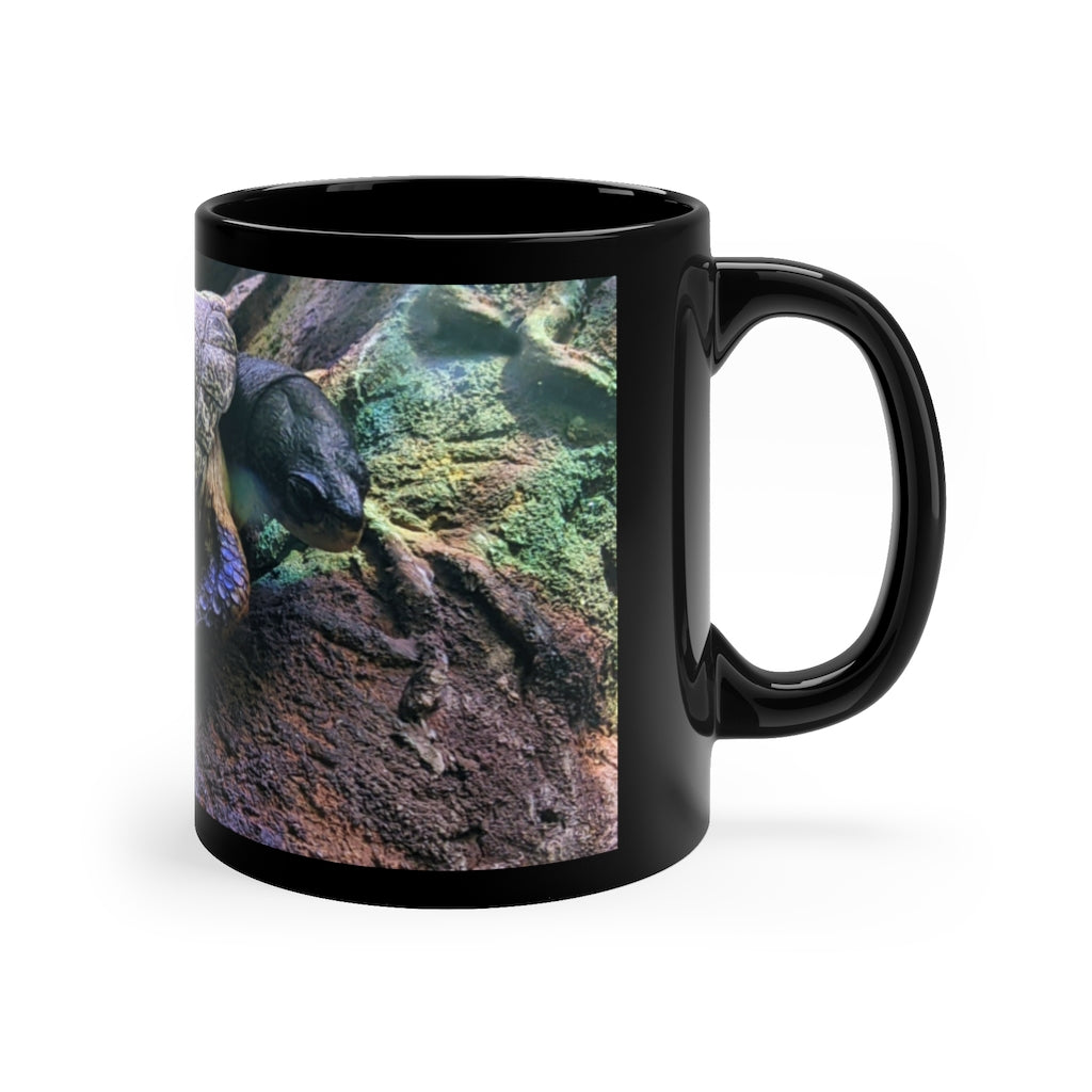 Turtle 11oz black ceramic mug with a sleek design, perfect for coffee, tea, or hot chocolate.