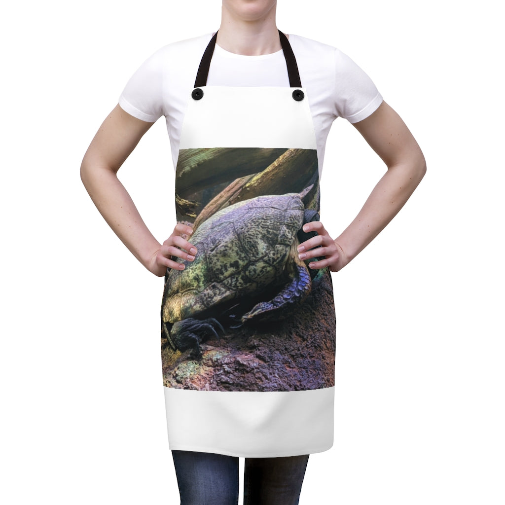 A stylish Turtle Apron made of lightweight polyester with black detachable twill straps, perfect for cooking and grilling.