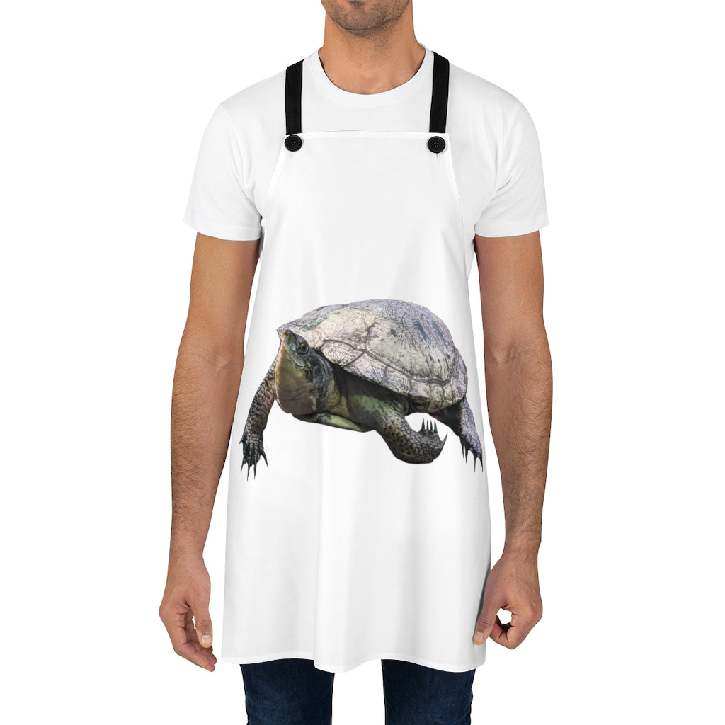 A stylish Turtle Apron made of lightweight polyester with a custom design and black detachable twill straps, perfect for cooking.