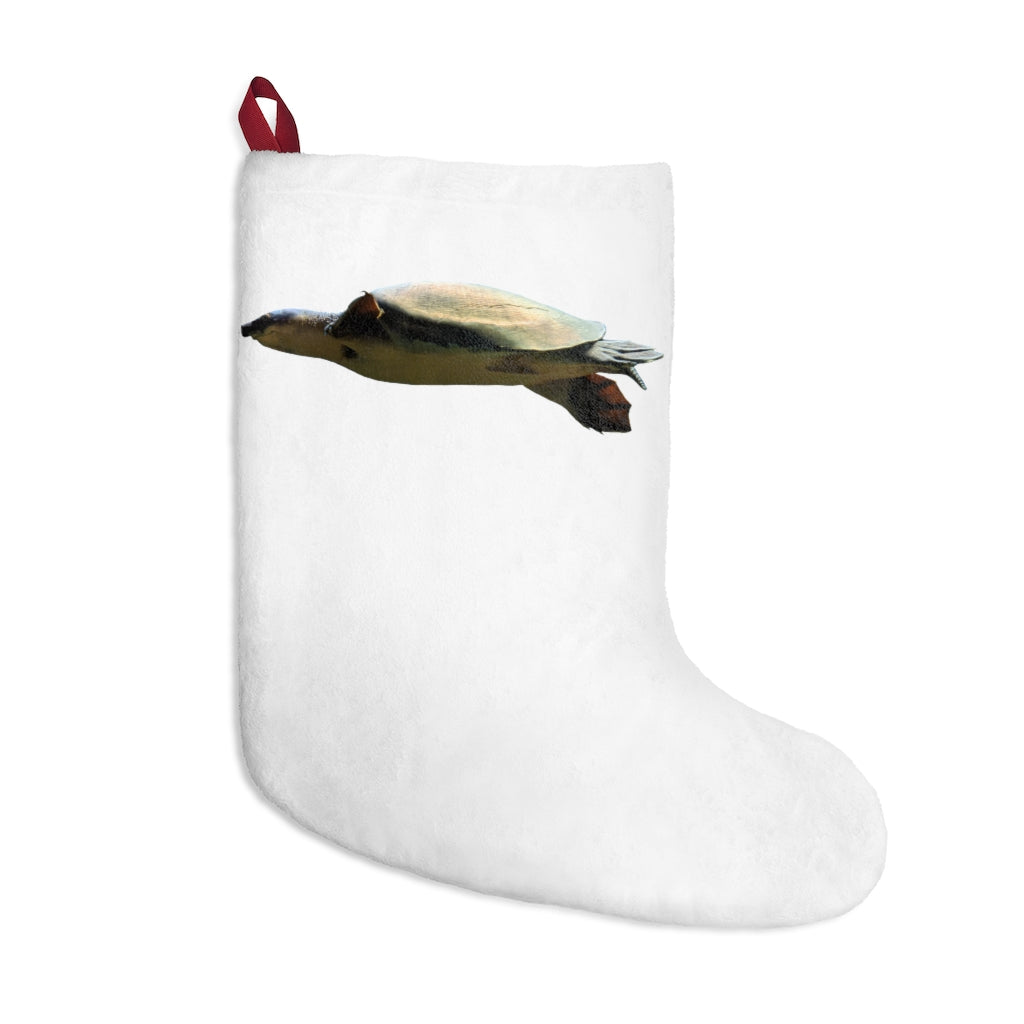 A cozy Turtle Christmas Stocking made of soft polyester fleece, featuring a festive design and a twill ribbon hanging loop, perfect for holiday decor.