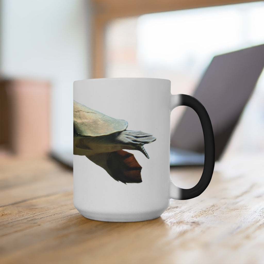 A Turtle Color Changing Mug showcasing its vibrant color transformation when filled with a hot beverage, featuring a rounded design and C-handle.