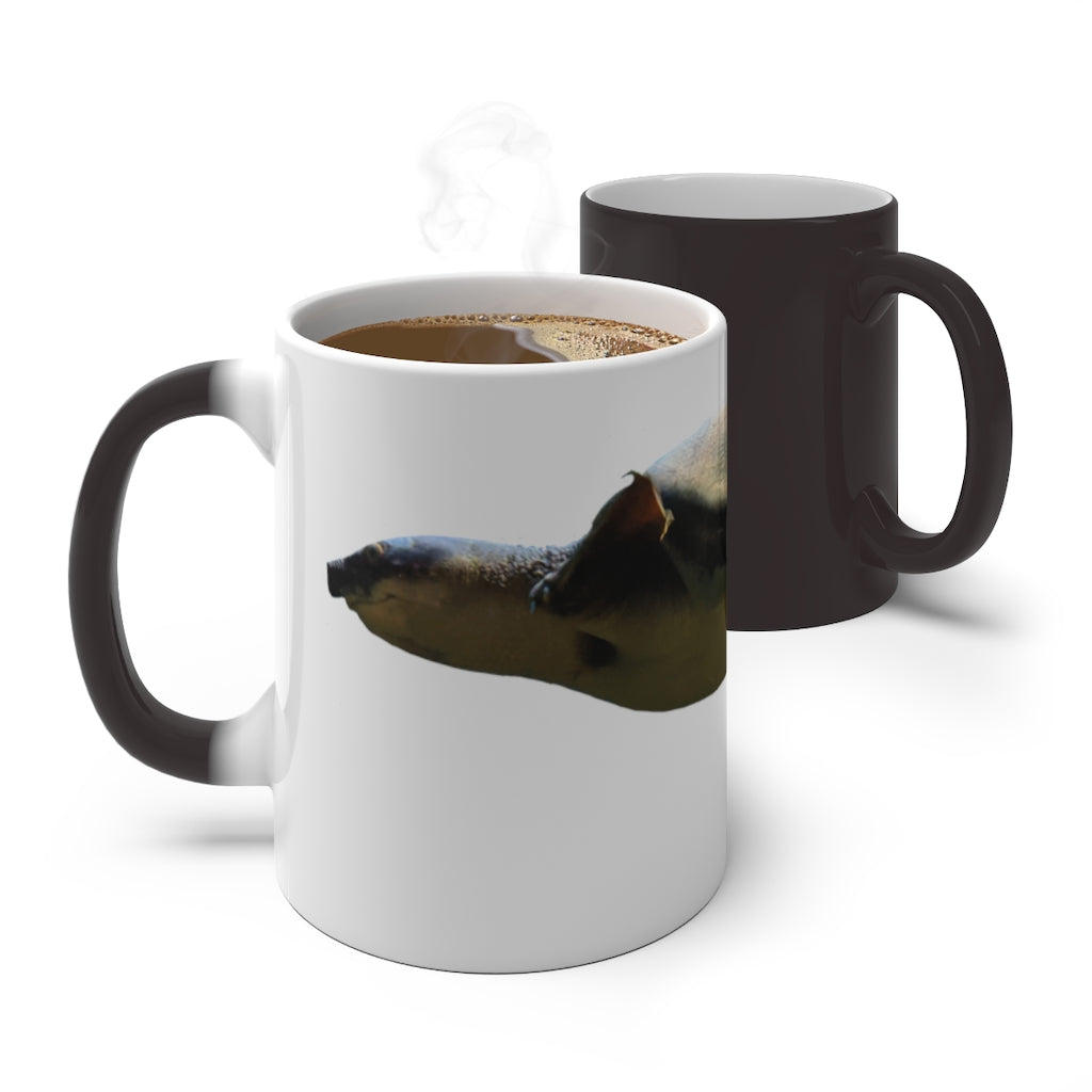 A Turtle Color Changing Mug showcasing its vibrant color transformation when filled with a hot beverage, featuring a rounded design and C-handle.