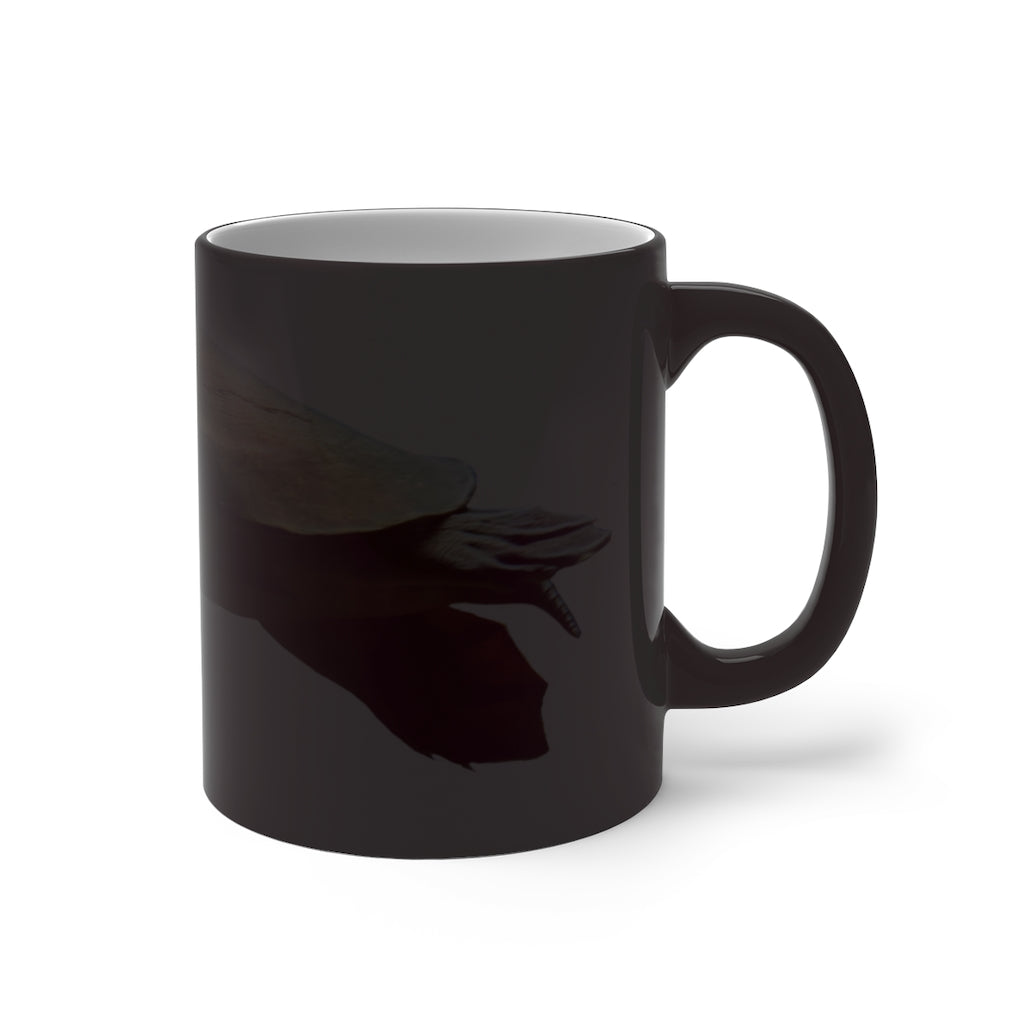 A Turtle Color Changing Mug showcasing its vibrant color transformation when filled with a hot beverage, featuring a rounded design and C-handle.