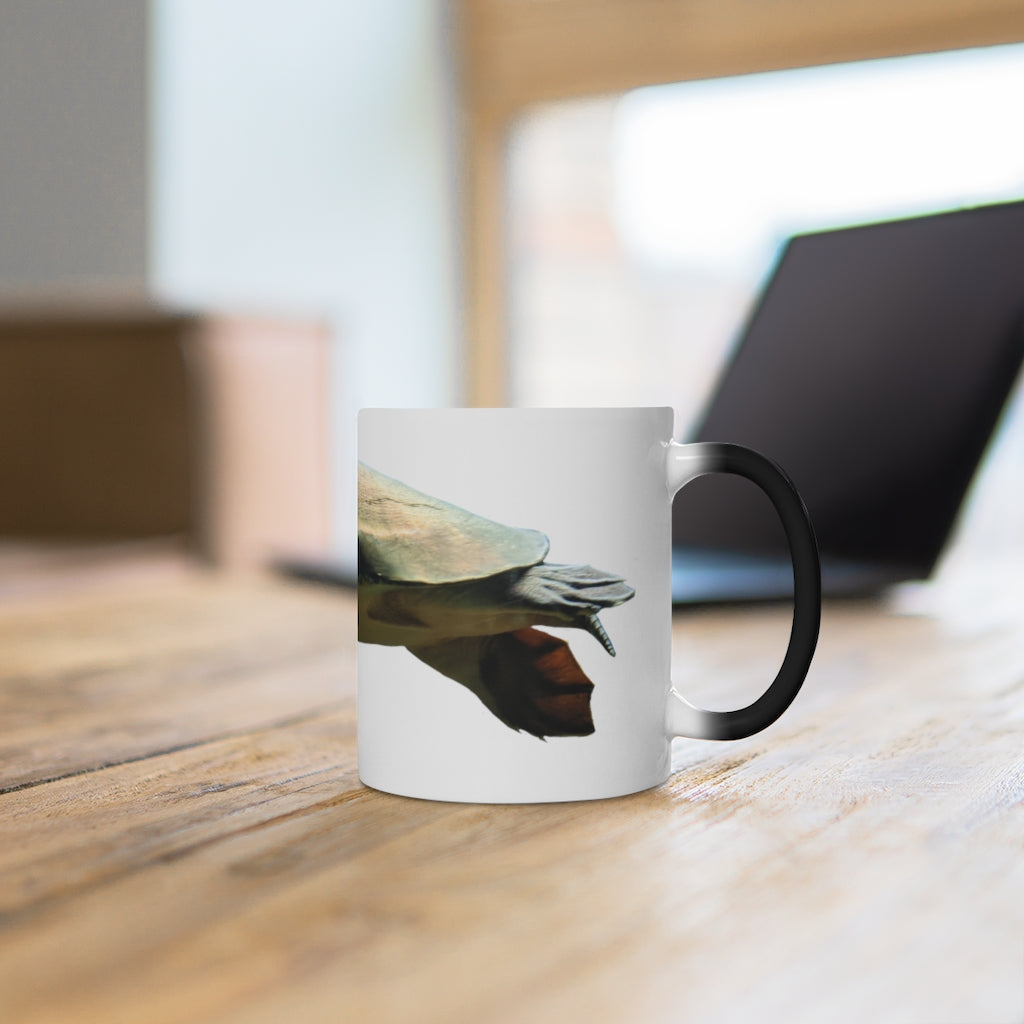 A Turtle Color Changing Mug showcasing its vibrant color transformation when filled with a hot beverage, featuring a rounded design and C-handle.