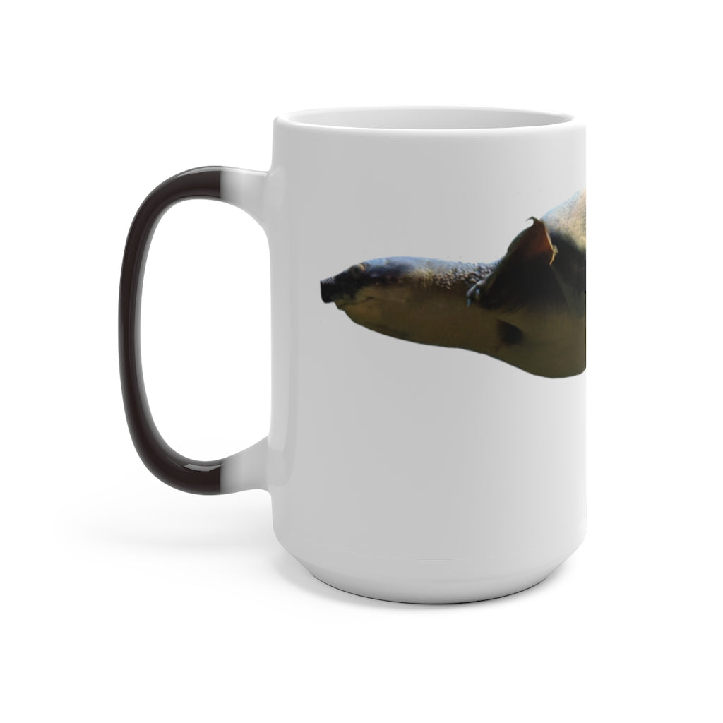 A Turtle Color Changing Mug showcasing its vibrant color transformation when filled with a hot beverage, featuring a rounded design and C-handle.