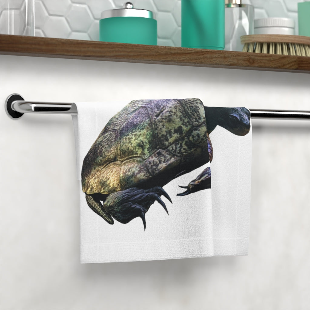 A Turtle Face Towel featuring a vibrant polyester front for printing and a soft, absorbent cotton back, ideal for personalizing your bathroom.