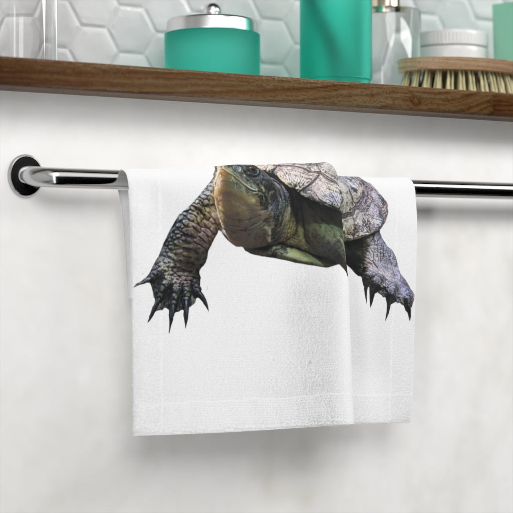 A vibrant Turtle Face Towel featuring a customizable polyester front and soft cotton back, perfect for personal use or as a gift.