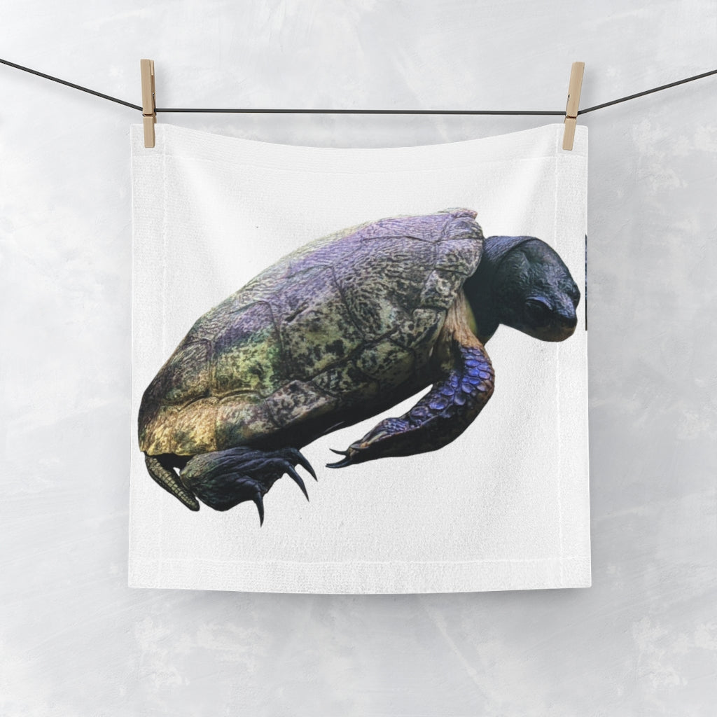 A Turtle Face Towel featuring a customizable polyester front and soft cotton back, ideal for personalizing your bathroom essentials.