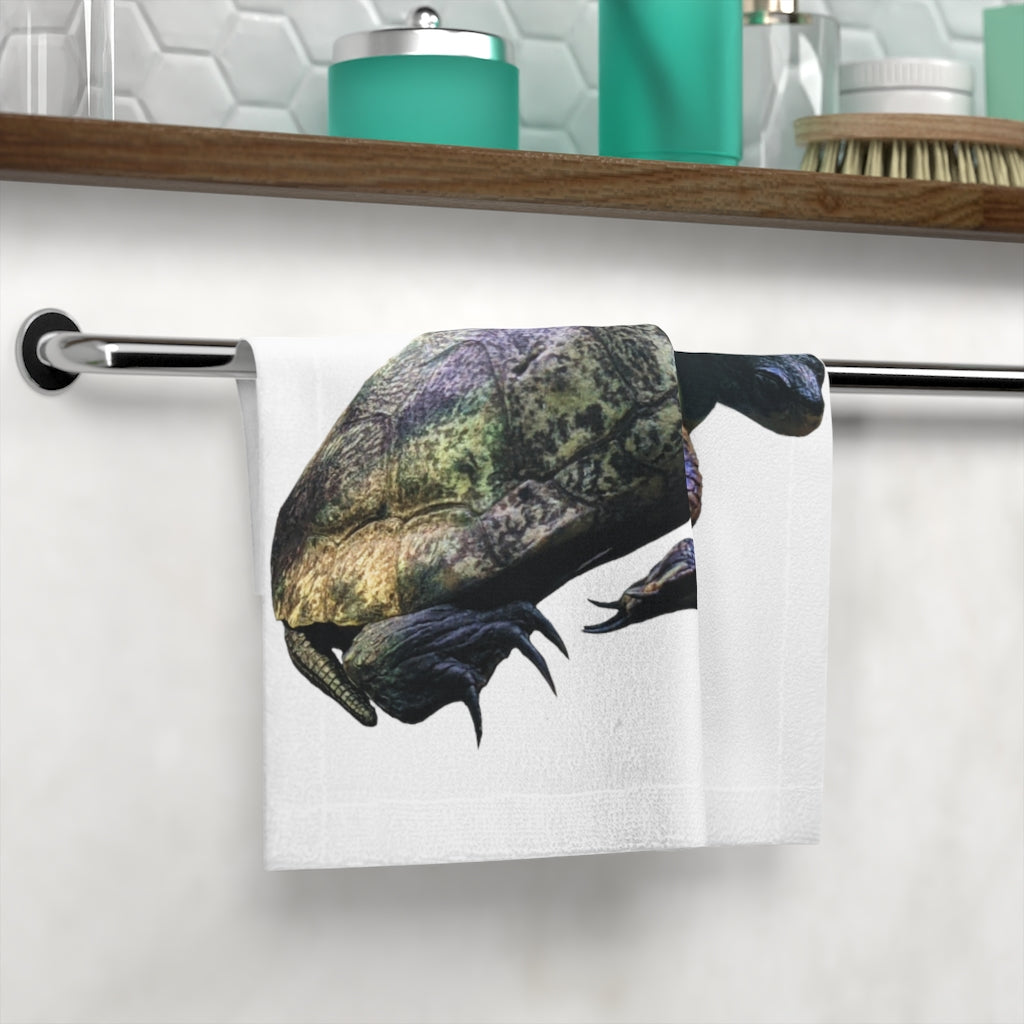 A Turtle Face Towel featuring a customizable polyester front and soft cotton back, ideal for personalizing your bathroom essentials.