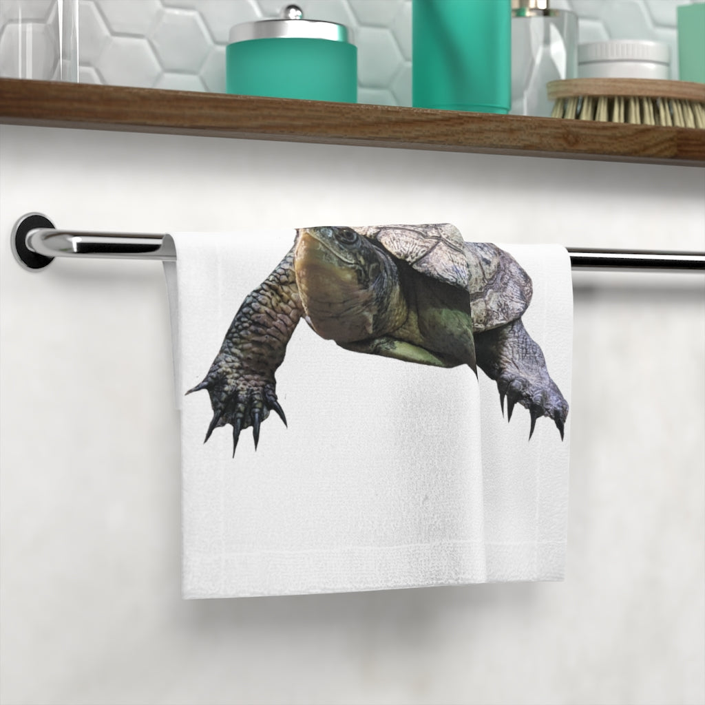 A vibrant Turtle Face Towel featuring a colorful printed design on a polyester front and soft cotton back, perfect for drying and customization.